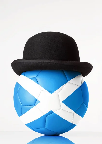 Futbol bir melon şapka — Stok fotoğraf