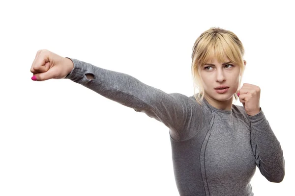 Mujer golpeando el aire — Foto de Stock