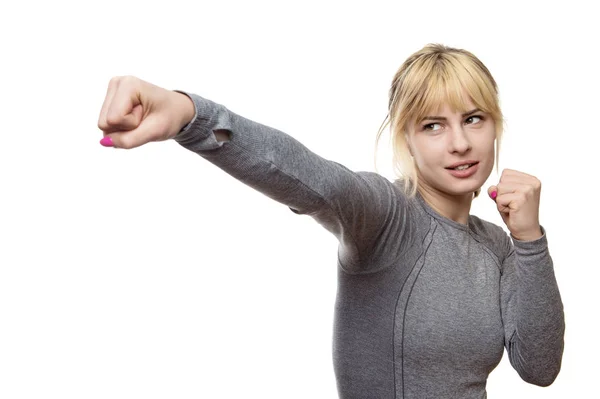 Vrouw ponsen de lucht — Stockfoto