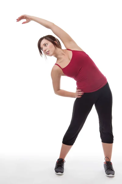 Estiramiento antes de un entrenamiento en el gimnasio — Foto de Stock