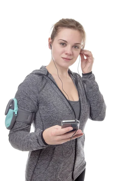 Vrouwelijke Fitness Model Luisteren Naar Muziek Haar Mobiele Telefoon — Stockfoto