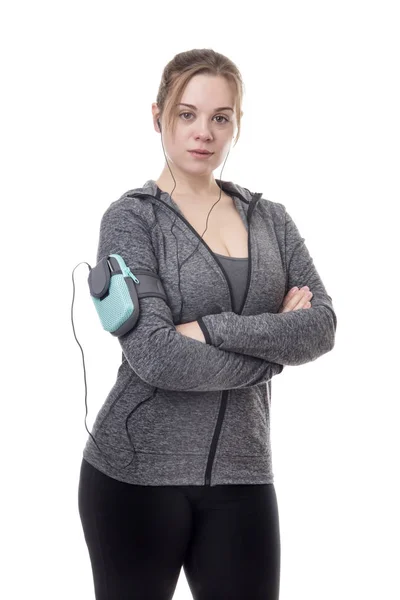 Model Fitness Kobiece Słuchanie Muzyki Jej Telefon Komórkowy — Zdjęcie stockowe