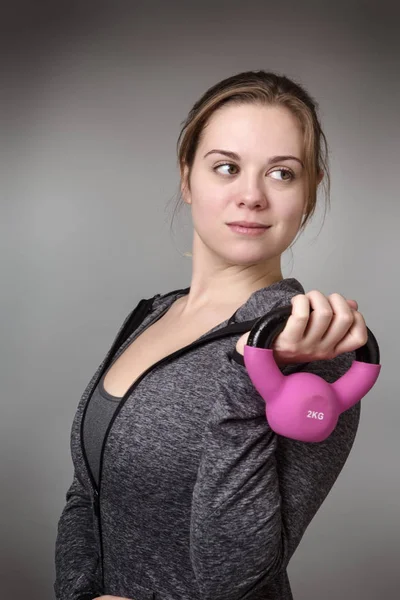 Young Model Holding Kettlebell — Stock Photo, Image