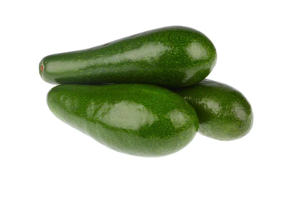 Grüne Avocado auf weißem Hintergrund — Stockfoto