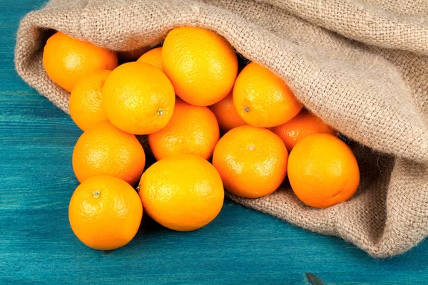 Freshly Picked Oranges in Burlap Bag — Stock Photo, Image