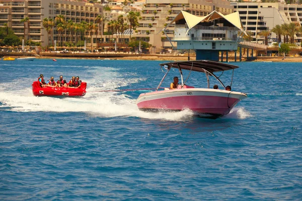 Happy people on water attractions — Stock Photo, Image