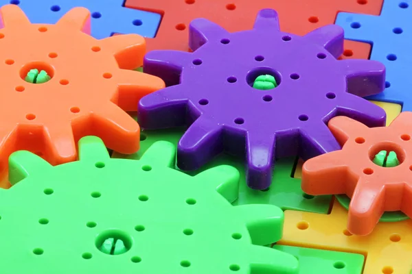 Macro photo of plastic wheel mechanism toy — Stock Photo, Image