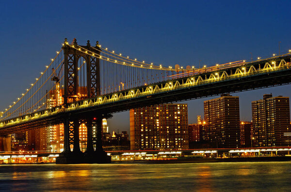 Manhattan Bridge at night in New York. USA