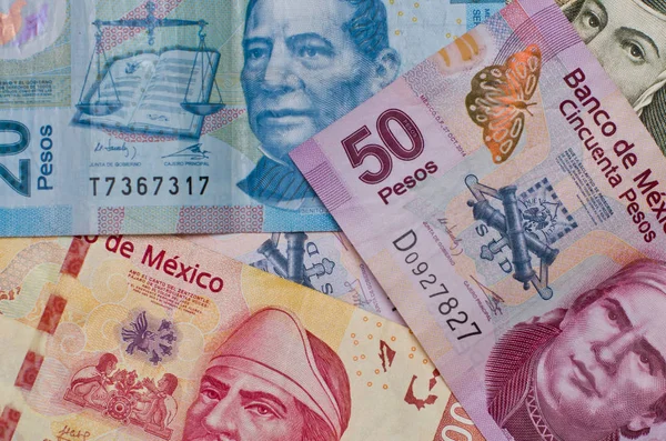 Különböző mexikói pénzt háttér. — Stock Fotó