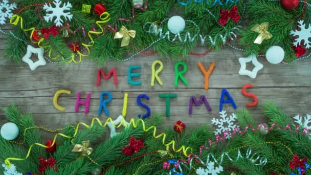 Stop motion-animering av god jul bokstäver, juldekoration. — Stockvideo