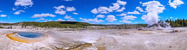 Castle Geyser eruption at Upper Geyser Basin in Yellowstone National Park, USA