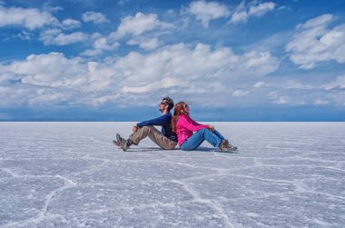 Couple at Salar de Uyuni , Bolivia clipart