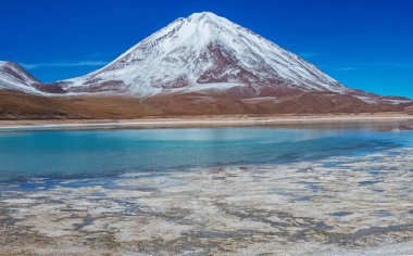 Laguna Verde at the foot of the volcano Licancabur in Eduardo Avaroa Andean Fauna National Reserve, Bolivia. clipart