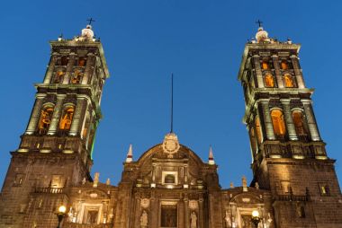 Puebla Cathedral at night in Puebla, Mexico clipart