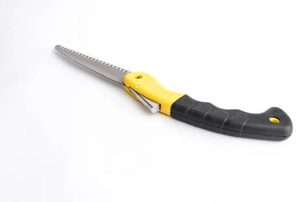 Folding garden hacksaw black-yellow saw on white background, saw — Stock Photo, Image