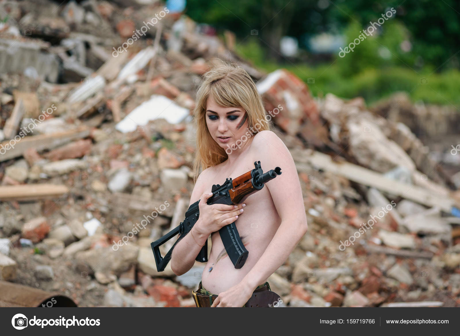 Topless Women Shooting Guns