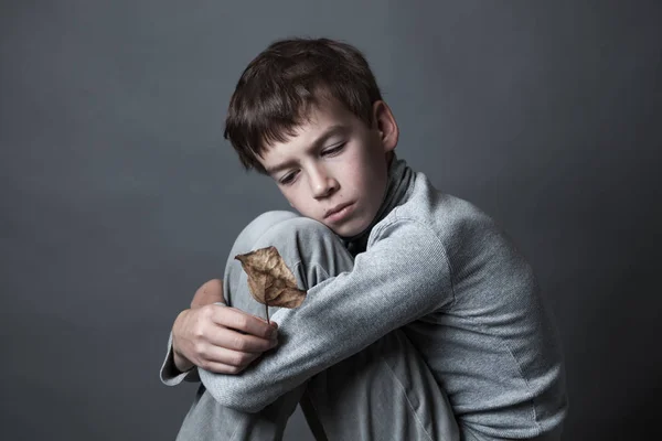 Portrait of sad teenager on gray background, — Stock Photo, Image