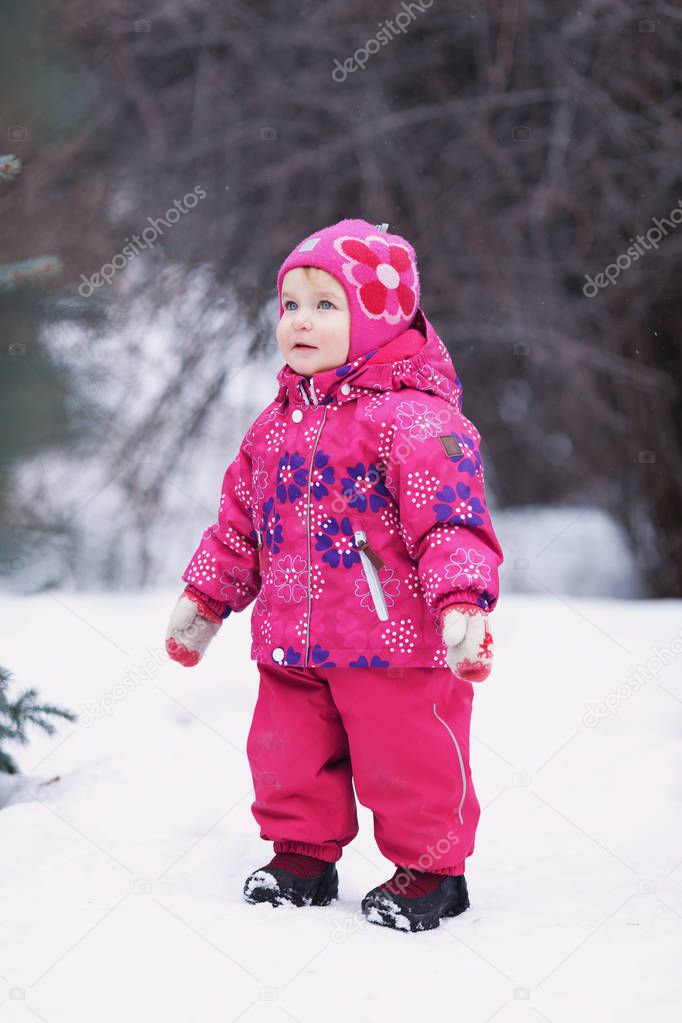Portrait of happy pretty girl near Christmas tree, winter,