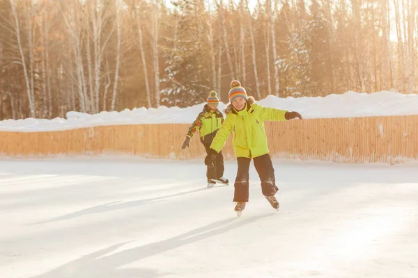 Cheerful happy boy lie on snow, — Stock Photo, Image