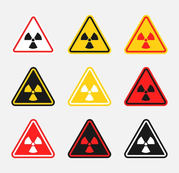 Набор знаков радиационной опасности, значки радиоактивной опасности — стоковый вектор
