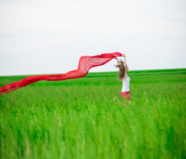 Genç Bayan runing doku yeşil alanı ile. Kadın eşarp ile.
