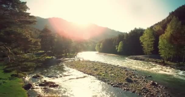 4k UHD aerial view. Low flight over fresh cold mountain river at sunny summer morning. — Stock Video