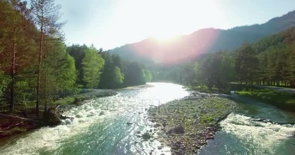 4k UHD aerial view. Low flight over fresh cold mountain river at sunny summer morning. — Stock Video