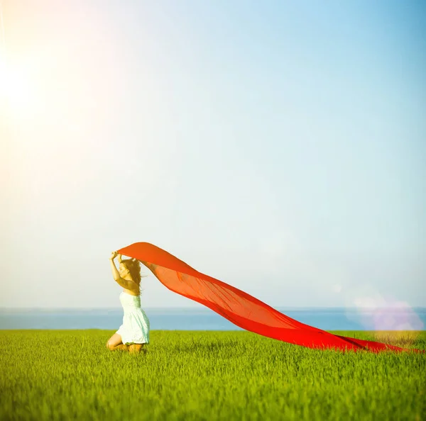 Young happy woman in wheat field with fabric. Summer lifestyle — Stock Photo, Image