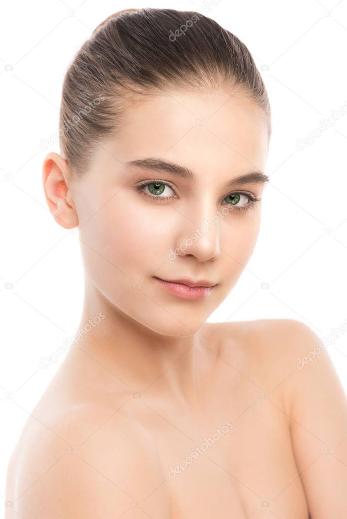 Portrait of beautiful young brunette woman with clean face. Isolated on a white.