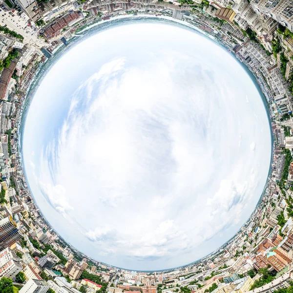 Aerial city view with crossroads and roads, houses, buildings, parks and parking lots. Sunny summer panoramic image — Stock Photo, Image