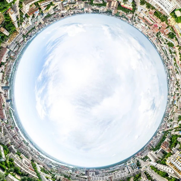 Aerial city view with crossroads and roads, houses, buildings, parks and parking lots. Sunny summer panoramic image — Stock Photo, Image