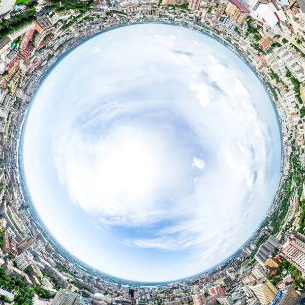 Aerial city view with crossroads and roads, houses, buildings, parks and parking lots. Sunny summer panoramic image — Stock Photo, Image