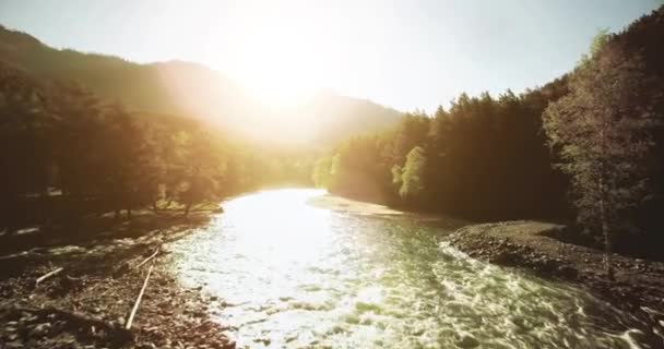 4k UHD aerial view. Low flight over fresh cold mountain river at sunny summer morning. — Stock Video