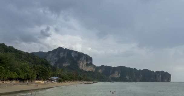 Time lapse of rain clouds over beach and sea landscape with boats. Tropical storm in ocean. — Stock Video