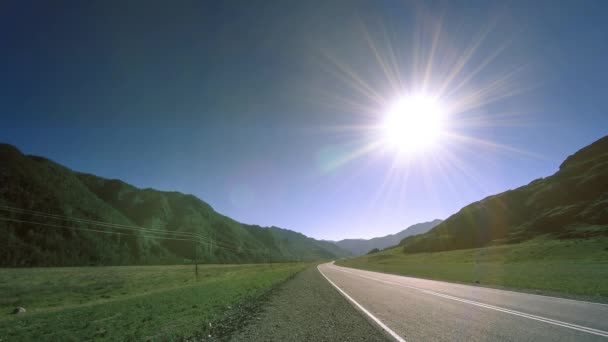 Mountain road timelapse at the summer or autumn sunset sunrise time. Wild nature and rural field. — Stock Video