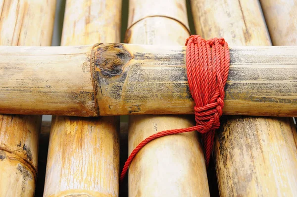 Fondo Bambú Está Atado Con Cuerda Nylon Rojo —  Fotos de Stock