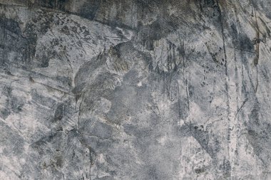 Gri arkaplanı olan beton duvar