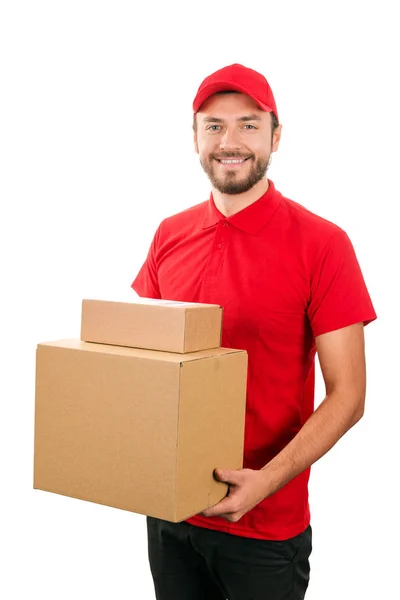 Servizio di consegna - giovane corriere che tiene una scatola di cartone — Foto Stock