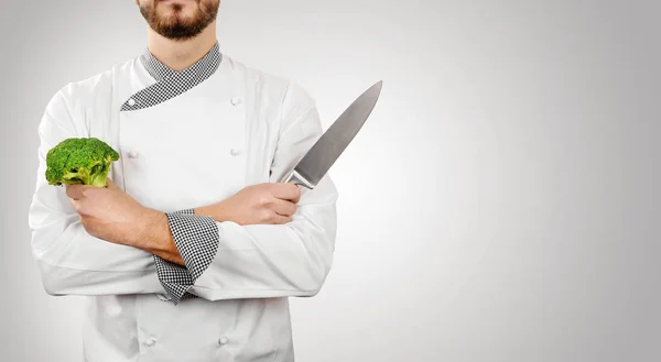 Chef op grijze achtergrond met kopie ruimte — Stockfoto