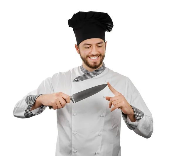 Šéfkuchař kontroluje jeho ostrost nože. izolované na bílém — Stock fotografie
