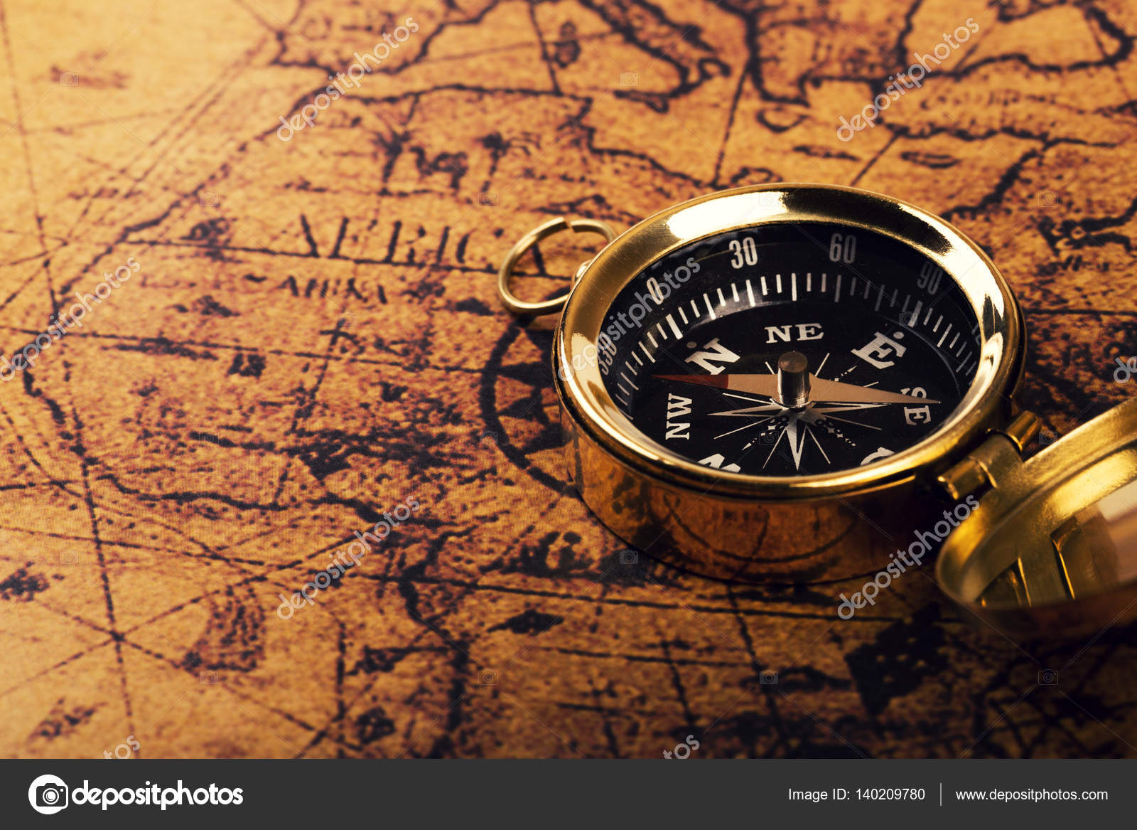 Old compass on vintage world map — Stock Photo © ronstik #140209780