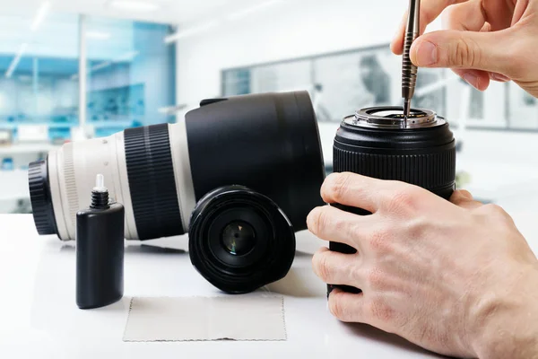 Camera lens service and maintenance — Stock Photo, Image