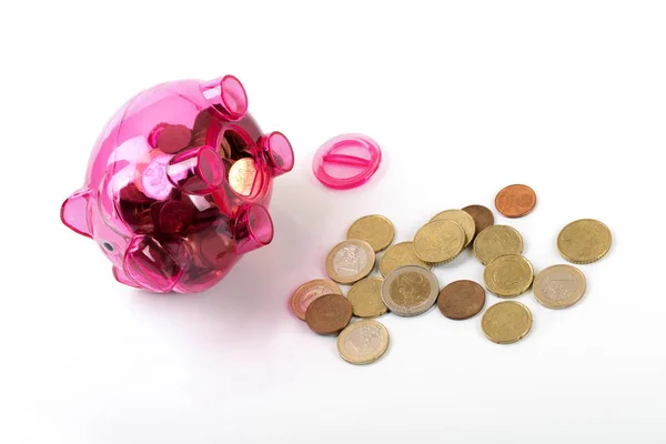 Opened piggy bank with coins isolated on white background — Stock Photo, Image