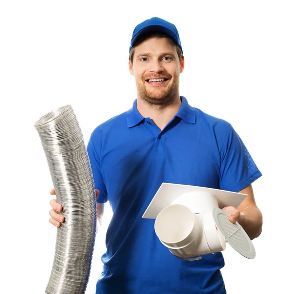 Arbeiter in blauer Uniform mit Lüftungsanlage in der Hand auf weiß — Stockfoto