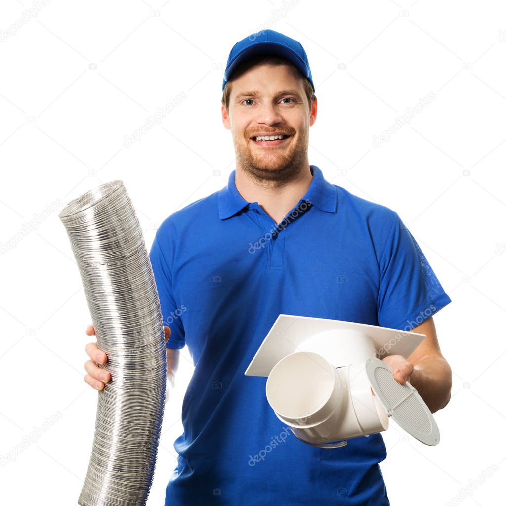 worker in blue uniform with ventilation system equipment in hands on white