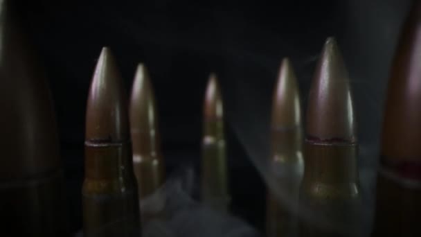 Closeup Bullets Smoke Black Background Dolly Shot — Stock Video