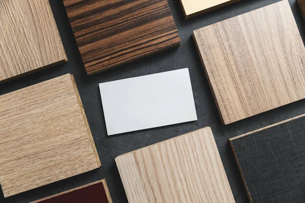 Furniture material samples with blank business card on black sto — Stock Photo, Image