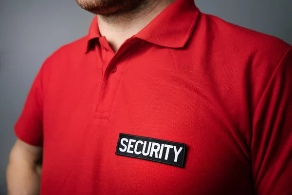 Closeup of security service guard uniform badge — Stock Photo, Image
