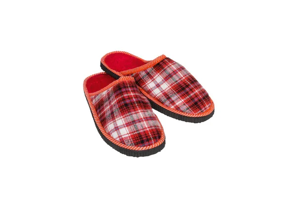 Een paar rode slippers Stockfoto