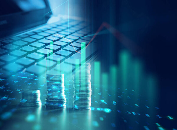 laptop keyboard on technology financial graph background.